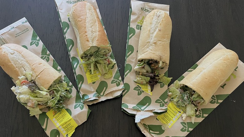 Four types of Panera Salad Stuffers laid out on table.
