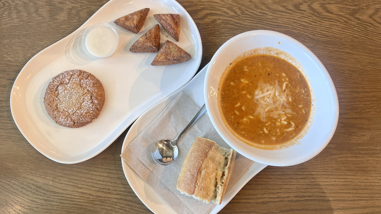Top view of soup, cookie, and cinnamon bites