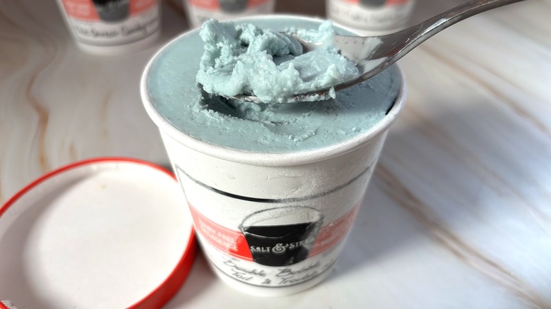 Spoonful of Salt & Straw Double Bubble Toil & Trouble ice cream over pint of ice cream