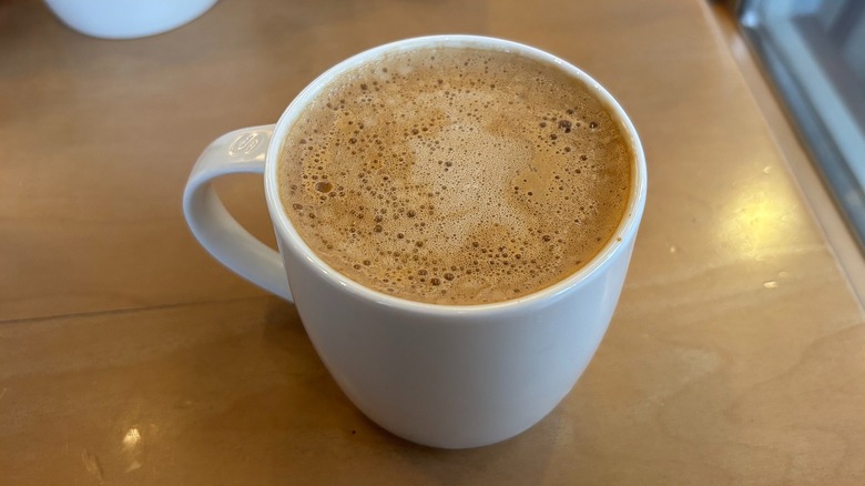 Close-up of Starbucks Pumpkin Oatmilk Cortado in white mug