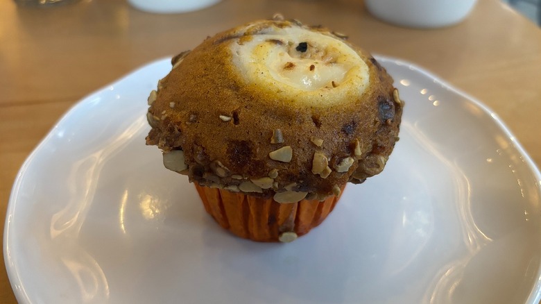 Starbucks Pumpkin Cream Cheese Muffin on white plate