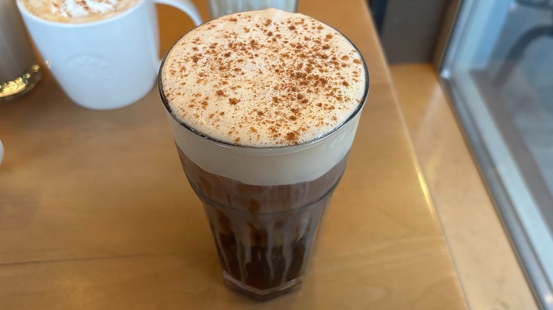 Close-up of Starbucks Pumpkin Cream Cold Brew in glass