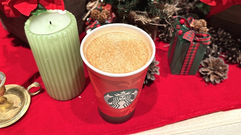 Eggnog Latte sits on a decorative table