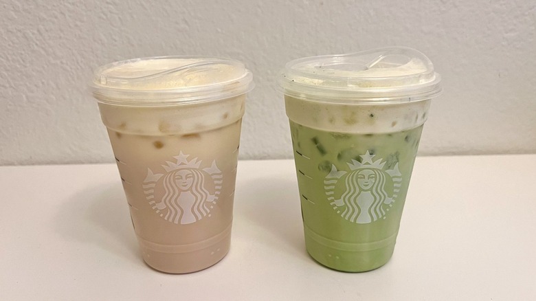 Starbucks  Iced Mango Cream Chai and Iced Mango Cream Matcha on a table
