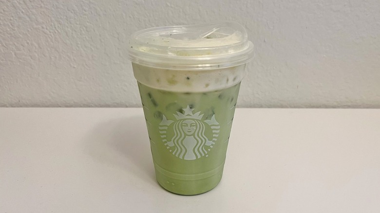 Starbucks Iced Mango Cream Matcha on a table