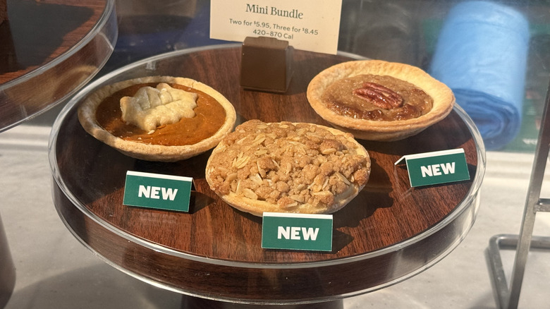 the three mini pies in a display case