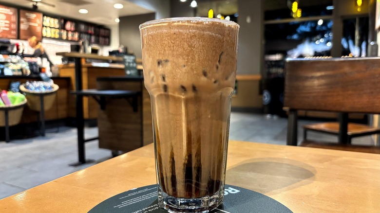Starbucks Iced Chocolate Cream Protein Cold Brew on table in store