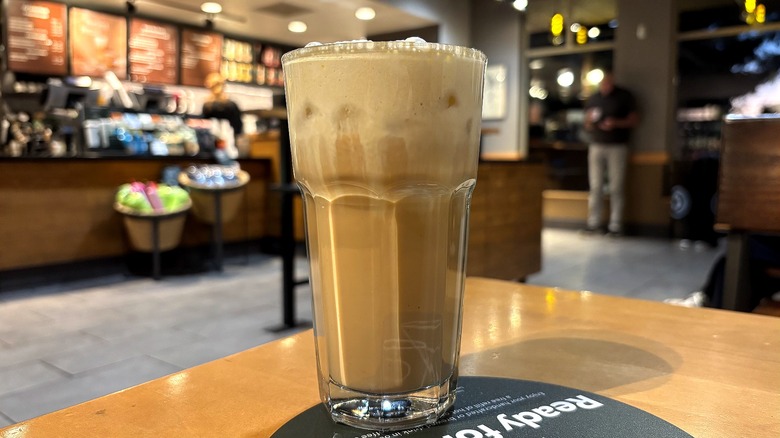 Starbucks Iced Vanilla Cream Protein Latte on table in store