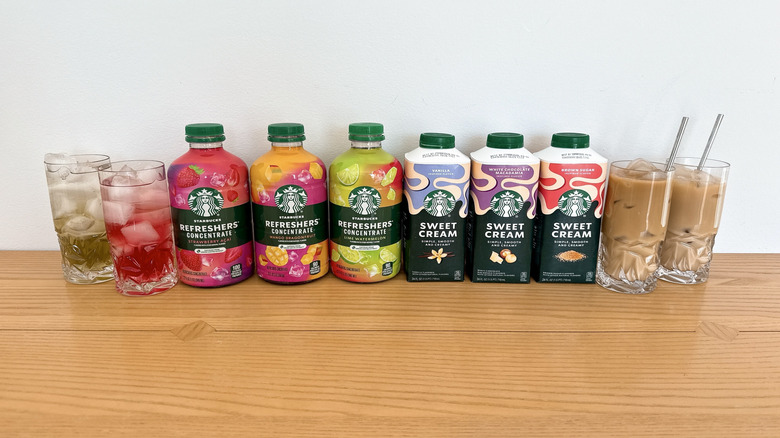 Bottles of Starbucks refreshers concentrates and sweet cream refreshers