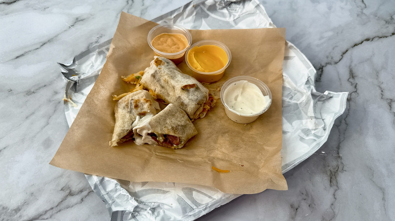 Taco Bell potato Cheesy Dipping Burritos with three sauces