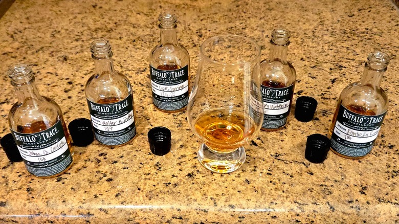 Open mini bottles of Prohibition Collection #3 with glass