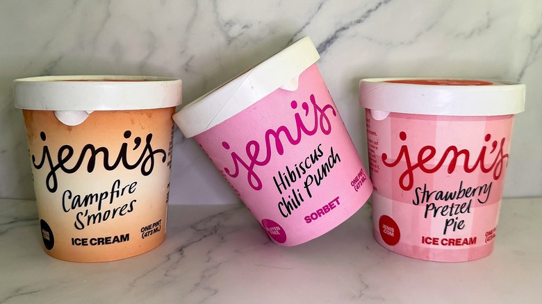 Three summer Jeni's ice cream pints on marble background