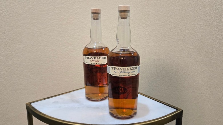 Unopened Traveller Whiskey bottles on table