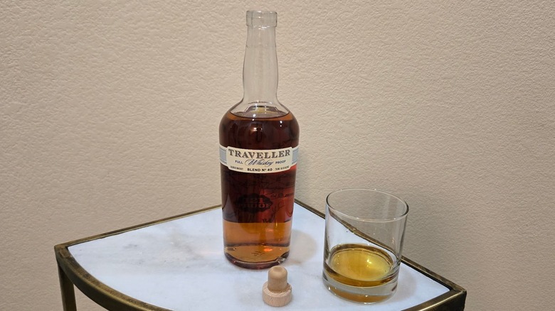 Bottle of Traveller Full Proof and rocks glass
