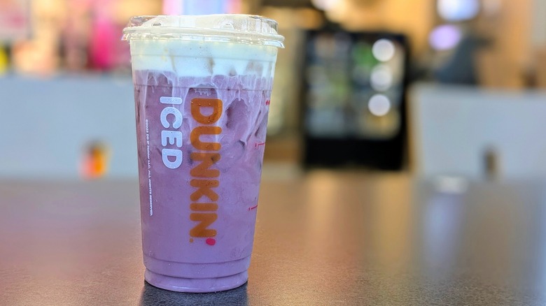 Dunkin' Mixed Berry Daydream Refresher on table in store