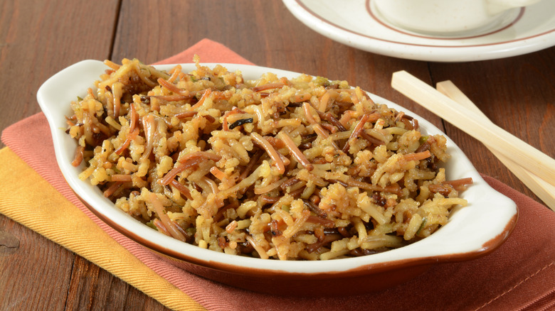 white bowl with Rice-a-Roni and napkins