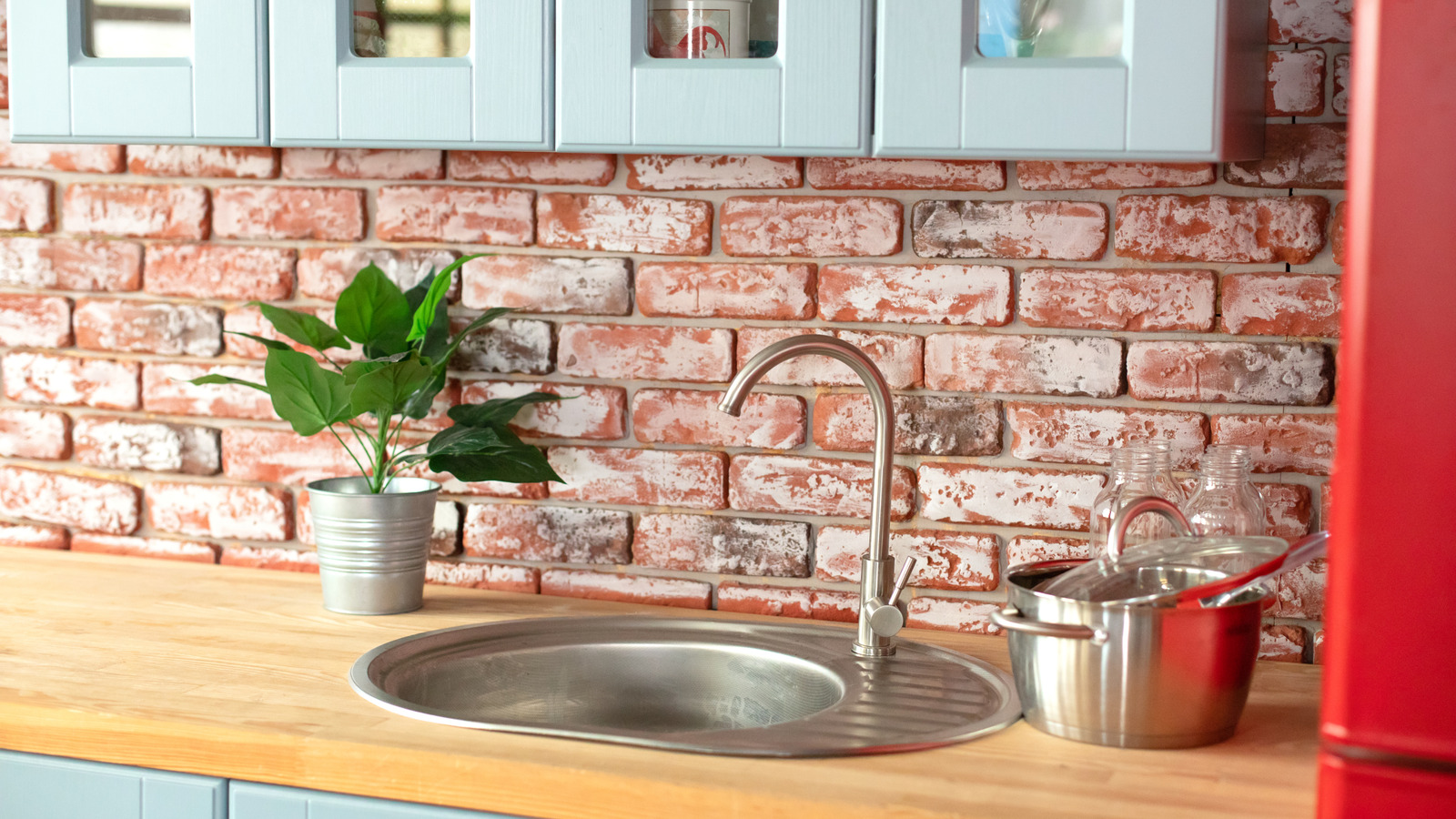 Give Brick Kitchens A Bold Revival With One Gorgeous Cabinet Color