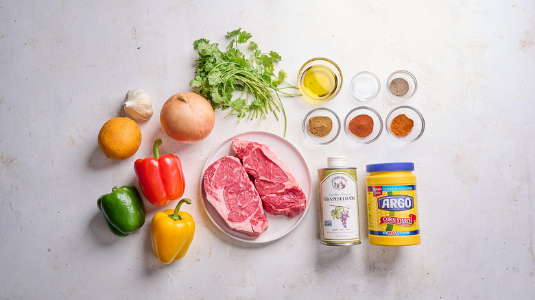 Ribeye steak fajitas ingredients on a table