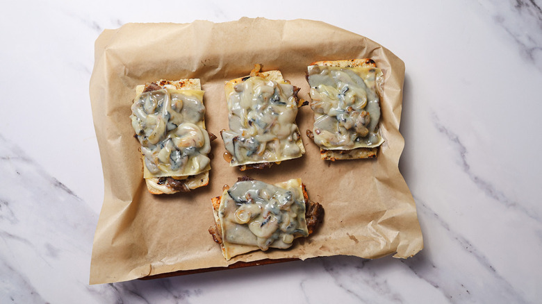 Steak sandwiches with broiled cheese