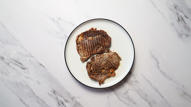 Cooked steak on plate