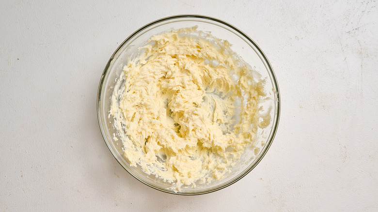 beaten butter in a bowl