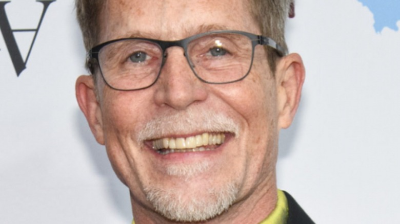 Rick Bayless smiles with glasses