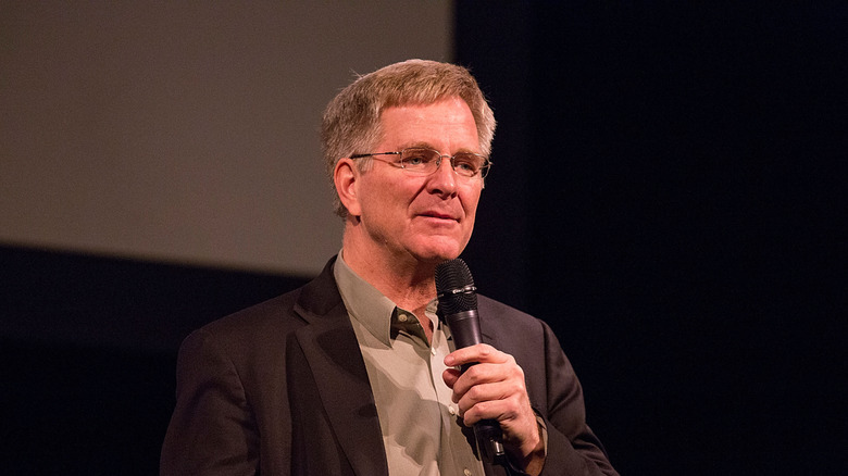 Rick Steves speaking on stage