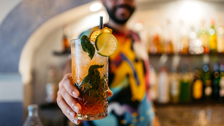 bartender serving a cocktail