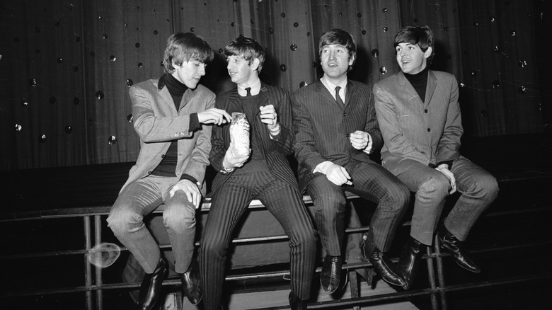 Ringo eating popcorn with The Beatles
