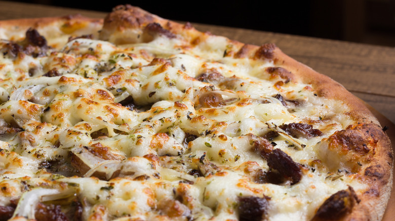 pizza with cheese and roasted garlic