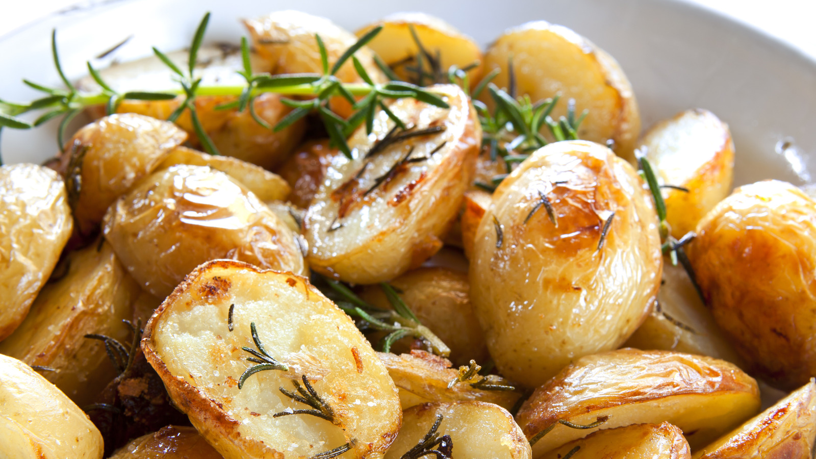 Roasted Potatoes Are Unbelievably Tasty When You Coat Them In This (It's Not Regular Butter Or Oil)