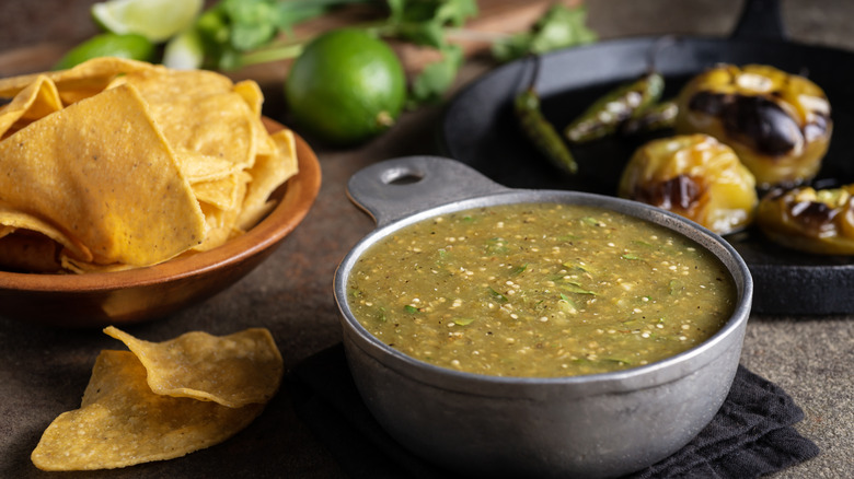 salsa verde and a basket of chips