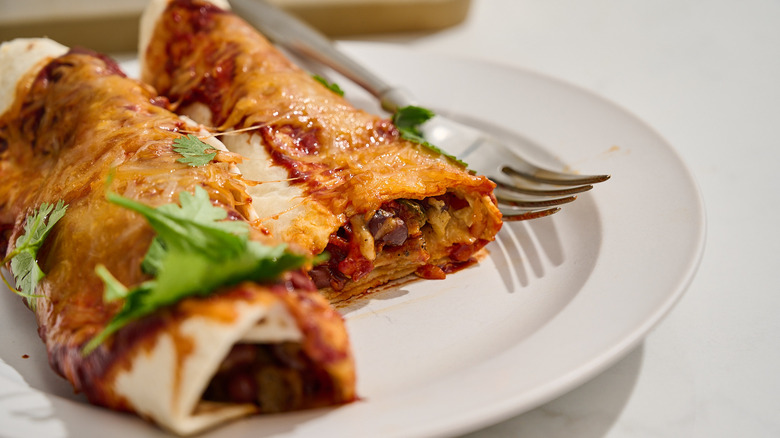 roasted veggie enchiladas on a plate