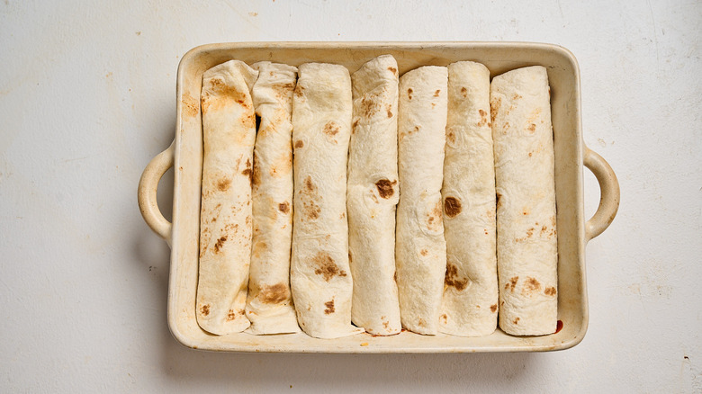 casserole dish filled with enchiladas
