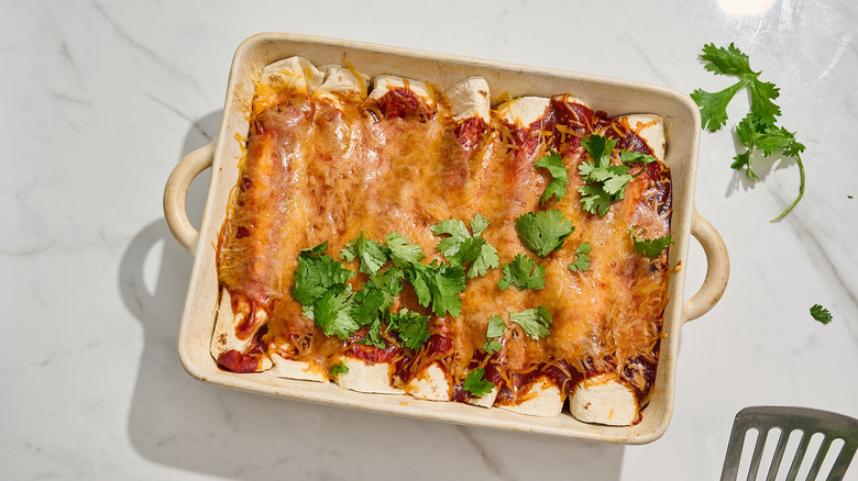 enchiladas topped with cilantro