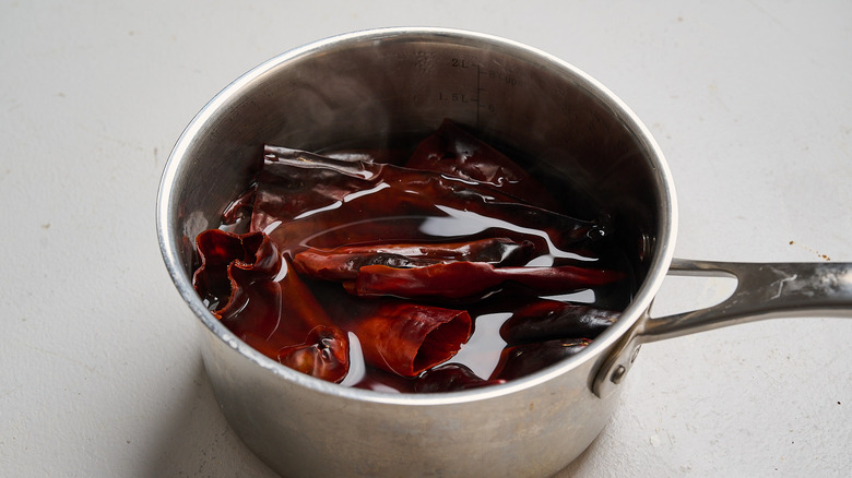 softening the chiles in water