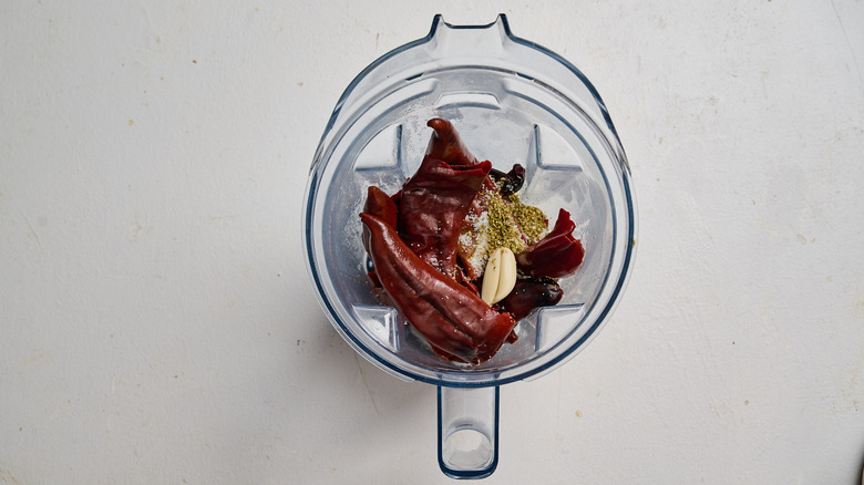 garlic and peppers in a blender