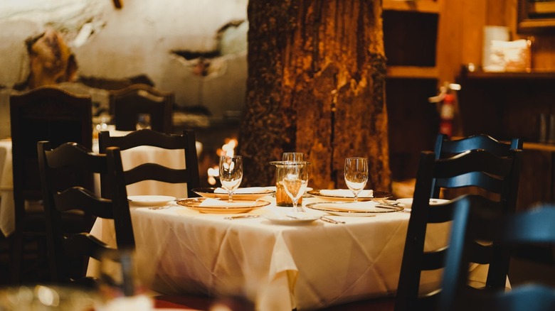 a candlelit dinner table at the Tree Room at Sundance Resort