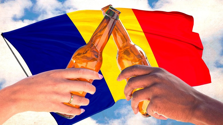 Romanian flag behind beer bottles