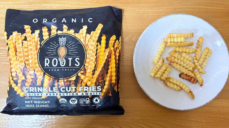Roots Crinkle Cut Fries bag next to fries on white plate