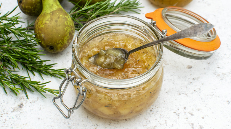 pear jam in jar with spoon