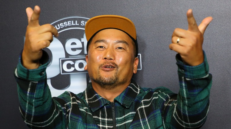Chef Roy Choi posing at a culinary event