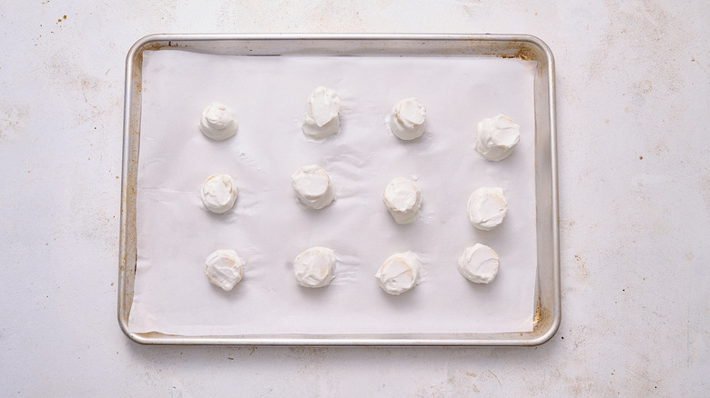yogurt dipped bananas on a sheet tray