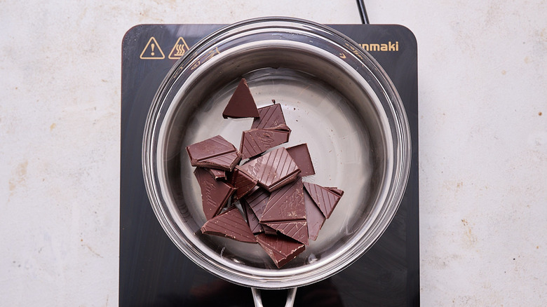 chocolate pieces in a bowl over simmering water