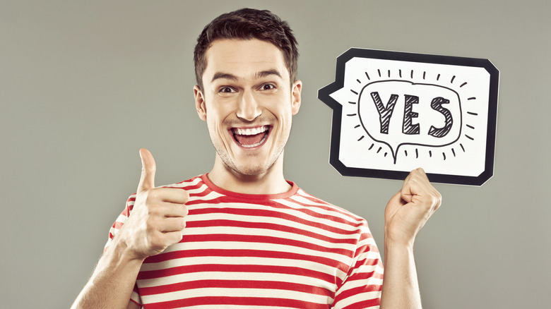 A person saying yes
