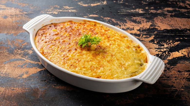 Cheese covered casserole in a dish
