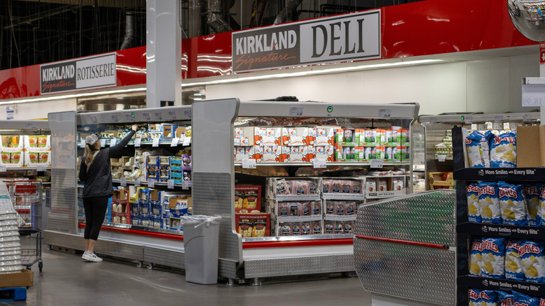 shoppers browsing Costco products at the Deli section in a US store