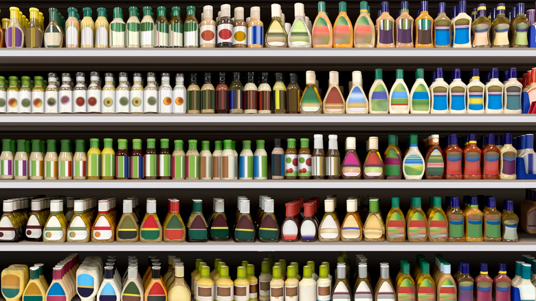 Many rows of bottled salad dressings