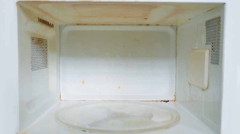 microwave interior with rust