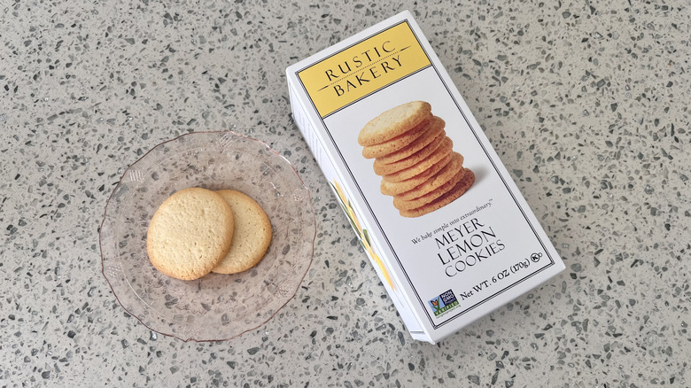 Meyer Lemon Cookies on a plate with a box